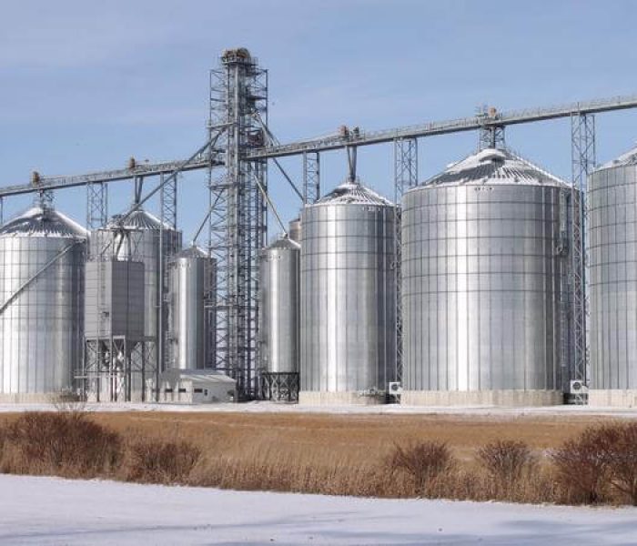 Grain Elevators with a dusting of snow on top.